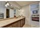 Stylish bathroom vanity featuring granite countertops and modern lighting at 4745 Cuyahoga Cv, Suwanee, GA 30024