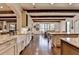 Spacious gourmet kitchen with granite countertops, hardwood floors, and breakfast area at 4745 Cuyahoga Cv, Suwanee, GA 30024