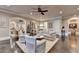 Inviting lower-level living area features comfortable seating, neutral decor, and access to recreational spaces at 4745 Cuyahoga Cv, Suwanee, GA 30024