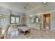 Spacious main bathroom with travertine floors, dual vanity, bathtub, and walk-in shower at 4745 Cuyahoga Cv, Suwanee, GA 30024