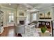 Cozy office with fireplace, hardwood floors, and comfortable seating area at 4745 Cuyahoga Cv, Suwanee, GA 30024