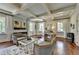Spacious office with coffered ceilings, hardwood floors, and ample natural light at 4745 Cuyahoga Cv, Suwanee, GA 30024