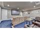 Home theater with a large screen and reclining seating at 4745 Cuyahoga Cv, Suwanee, GA 30024