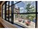 Scenic view from a window of the backyard patio and golf course beyond at 4745 Cuyahoga Cv, Suwanee, GA 30024