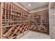 Climate controlled wine cellar with custom, handcrafted, storage for a large collection at 4745 Cuyahoga Cv, Suwanee, GA 30024