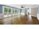 Expansive living area with hardwood floors, natural light, and deck access at 2108 Yorkshire Ct, Woodstock, GA 30189