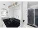 Bathroom features a double sink vanity, shower and closet at 2108 Yorkshire Ct, Woodstock, GA 30189