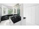 Main bathroom with double sink vanity, shower and closet space at 2108 Yorkshire Ct, Woodstock, GA 30189
