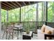 Serene wooden balcony furnished with table and seating at 408 River Run Dr, Sandy Springs, GA 30350