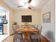 Inviting dining area with a sleek table setting, perfect for entertaining, with a view into the kitchen at 408 River Run Dr, Sandy Springs, GA 30350