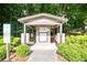 Mail kiosk surrounded by lush green landscaping and shrubbery at 408 River Run Dr, Sandy Springs, GA 30350