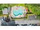 Aerial view of the community pool with lounge chairs and ample parking at 408 River Run Dr, Sandy Springs, GA 30350