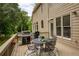 Deck boasts ample seating, perfect for outdoor dining and relaxation with the view of the backyard at 610 Woodstream Ct, Roswell, GA 30075