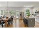 Eat-in kitchen with stainless steel appliances and views of the dining area at 610 Woodstream Ct, Roswell, GA 30075