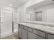 Primary bathroom with dual sinks and updated vanity at 8223 Coldstream Dr, Fairburn, GA 30213
