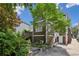 Backyard exterior showcasing a deck, stairs, and lush greenery surrounding the property, perfect for outdoor living at 16 Walker Ne Ter, Atlanta, GA 30309