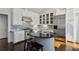 Bright kitchen featuring stainless steel appliances, white cabinets and dark countertops at 16 Walker Ne Ter, Atlanta, GA 30309