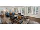 Bright living room featuring modern furniture, hardwood floors and many windows at 16 Walker Ne Ter, Atlanta, GA 30309
