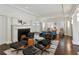 Elegant living room with hardwood floors, fireplace, and comfortable seating at 16 Walker Ne Ter, Atlanta, GA 30309