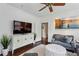 Open concept living area with a large TV, comfortable seating, and elegant decor at 16 Walker Ne Ter, Atlanta, GA 30309