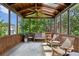 Sunroom with wood paneling, ceiling fan, and outdoor views at 16 Walker Ne Ter, Atlanta, GA 30309