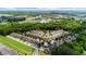 Scenic aerial view showcasing lush landscaping surrounding cozy single-Gathering homes in this beautiful neighborhood at 397 Cypher Dr, Suwanee, GA 30024