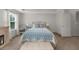 Bright main bedroom features a fireplace, tray ceilings, and a large window at 397 Cypher Dr, Suwanee, GA 30024