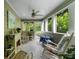 Charming sunroom with lots of windows and a ceiling fan at 397 Cypher Dr, Suwanee, GA 30024