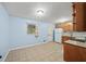Cozy eat-in kitchen featuring tile floors and stainless steel appliances at 6516 Maddox Rd, Morrow, GA 30260