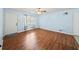 The living room features beautiful wood-look floors, and lots of natural light at 6516 Maddox Rd, Morrow, GA 30260