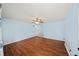 This light-filled living room features wood-look floors, and a ceiling fan at 6516 Maddox Rd, Morrow, GA 30260