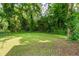A large yard with mature trees providing shade at 752 Jefferson Sw Ave, Atlanta, GA 30315