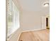 This bedroom has light walls, trim, and hardwood floors at 752 Jefferson Sw Ave, Atlanta, GA 30315