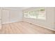 Bright bedroom with hard wood flooring and neutral colored walls at 752 Jefferson Sw Ave, Atlanta, GA 30315