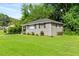 Well-manicured lawn surrounds this charming home, showcasing fresh landscaping and curb appeal at 752 Jefferson Sw Ave, Atlanta, GA 30315
