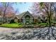 Inviting community clubhouse with manicured lawns, flowering shrubs, and beautiful façade at 1315 Mcgill Park Ne Ave, Atlanta, GA 30312