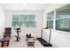 Bright exercise room features multiple windows and exercise equipment at 1534 Bedstone Dr, Canton, GA 30114