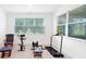 Bright workout room with multiple windows and exercise equipment at 1534 Bedstone Dr, Canton, GA 30114