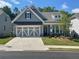 Charming single-Gathering home featuring a two-car garage, well-manicured lawn, and inviting curb appeal at 1534 Bedstone Dr, Canton, GA 30114