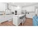 Spacious kitchen featuring a large island with seating, stainless steel appliances, and ample cabinet space at 1534 Bedstone Dr, Canton, GA 30114