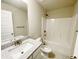 Bathroom featuring a single sink vanity with granite countertops and shower-tub combo at 2314 Shetley Creek Dr, Norcross, GA 30071