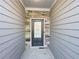 Entryway featuring stone accents and modern door with glass panel at 2314 Shetley Creek Dr, Norcross, GA 30071