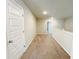Hallway featuring carpet flooring and white doors at 2314 Shetley Creek Dr, Norcross, GA 30071