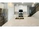 Kitchen island featuring granite countertops and stainless steel sink at 2314 Shetley Creek Dr, Norcross, GA 30071