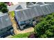 Aerial view showcasing a back patio, and a small landscaped yard and the roof at 2968 Oshields Sw Ct # 4, Marietta, GA 30060