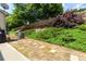 Backyard space includes a privacy fence, lush greenery, and a paver patio, perfect for outdoor enjoyment at 2968 Oshields Sw Ct # 4, Marietta, GA 30060