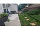 Spacious backyard with a stone paver walkway, grass and a patio area at 2968 Oshields Sw Ct # 4, Marietta, GA 30060