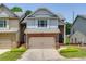Charming townhome with a two-car garage, brick accents and a neatly landscaped front yard at 2968 Oshields Sw Ct # 4, Marietta, GA 30060