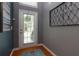 Inviting foyer featuring hardwood floors, decorative wall art, and natural light, enhancing the home's entry experience at 2968 Oshields Sw Ct # 4, Marietta, GA 30060