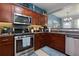 This modern kitchen features stainless steel appliances and granite countertops, ready for meal preparation at 2968 Oshields Sw Ct # 4, Marietta, GA 30060